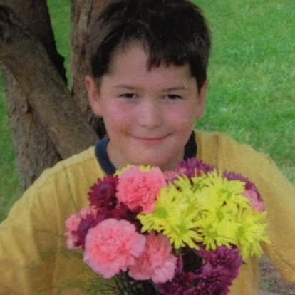 Young Garrison with flowers