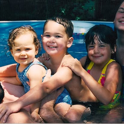 Garrison as a child at the pool